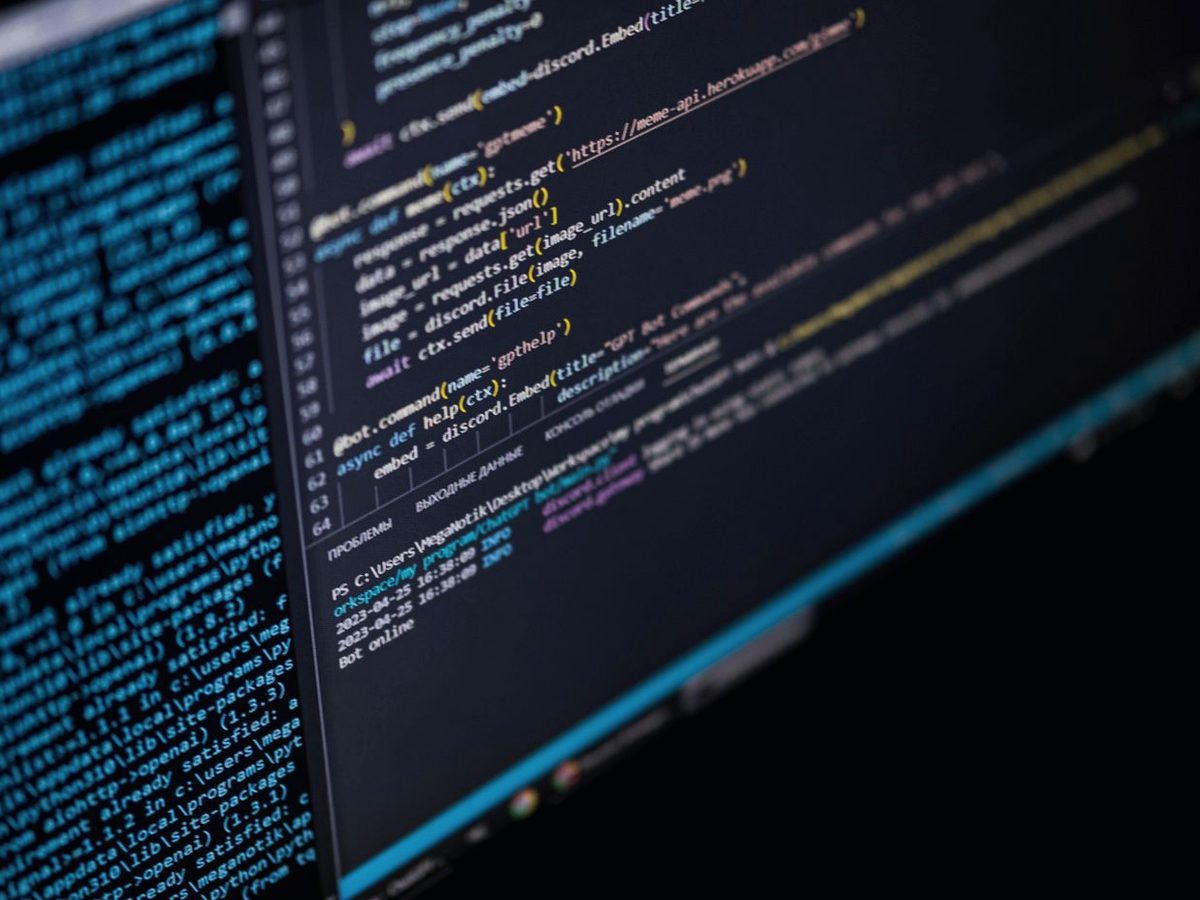 Source code on a dark editor screen during a website build.